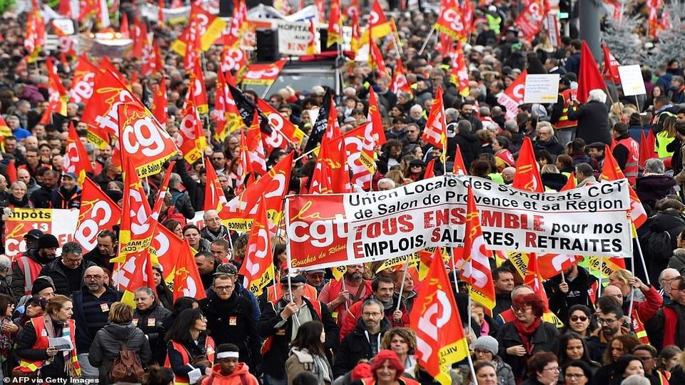 1.5 million French workers take to the streets against Macron’s pension reforms
