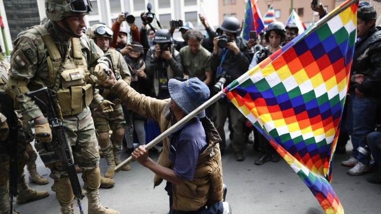 Bolivia’s de facto president enacts law to hold general elections on September 6