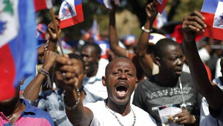 Haitian social organizations demonstrate outside the US embassy