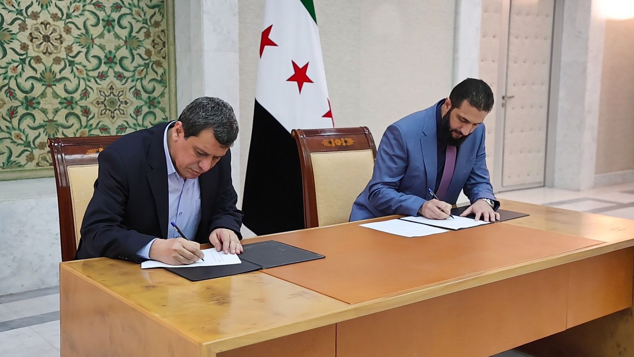 Interim Syrian government integrates US-backed Kurdish forces in the wake of fresh sectarian violence