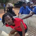 activist Alieu Bah thrown in white truck by Gambian police