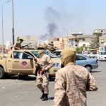 Libya militias clash