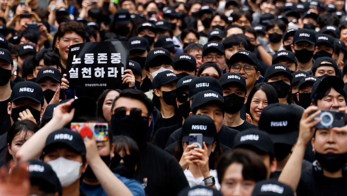 Defying threats of replacement, thousands of Samsung workers go on indefinite strike