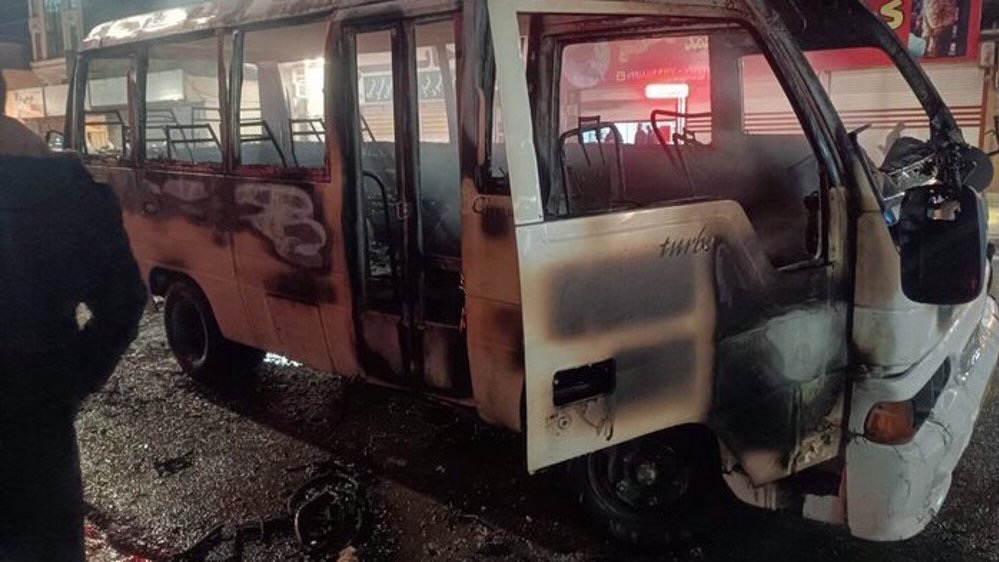 A public transport vehicle set ablaze by rioters in Iran’s western city of Ilam on January 6, 2025.