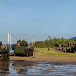 U.S. Marines with Battalion Landing Team 3/6, 22nd Marine Expeditionary Unit (Special Operations Capable), stage light armored vehicles ashore in Arroyo, Puerto Rico, September 22, 2025.