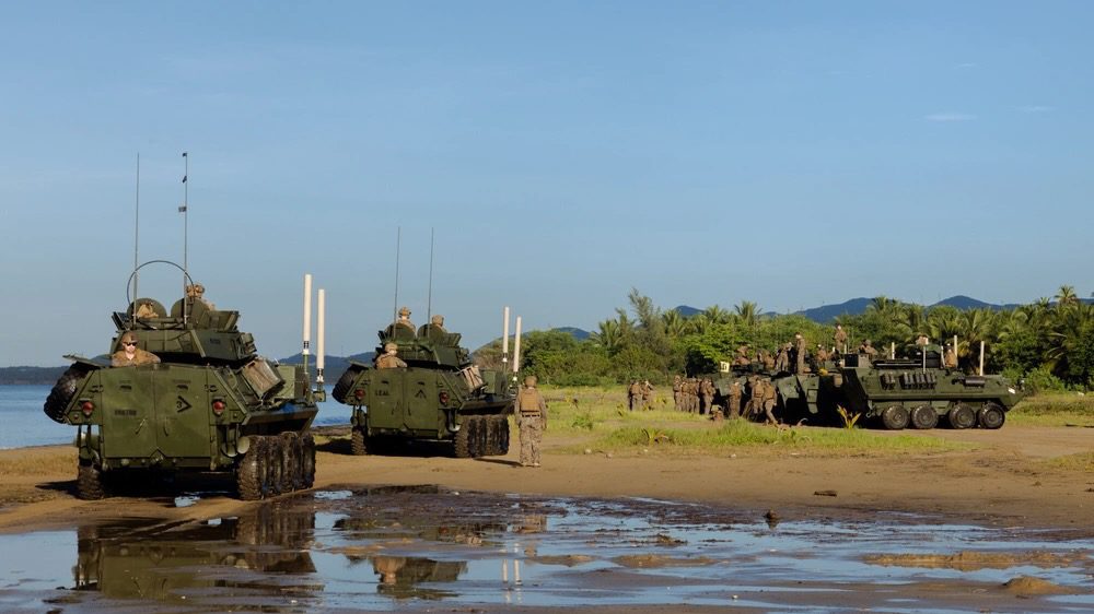 U.S. Marines with Battalion Landing Team 3/6, 22nd Marine Expeditionary Unit (Special Operations Capable), stage light armored vehicles ashore in Arroyo, Puerto Rico, September 22, 2025.