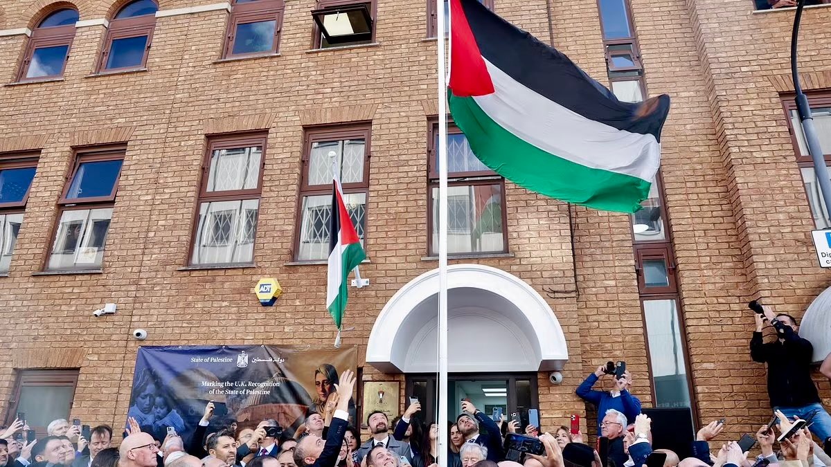 Palestinian flag being raised at the new embassy in London