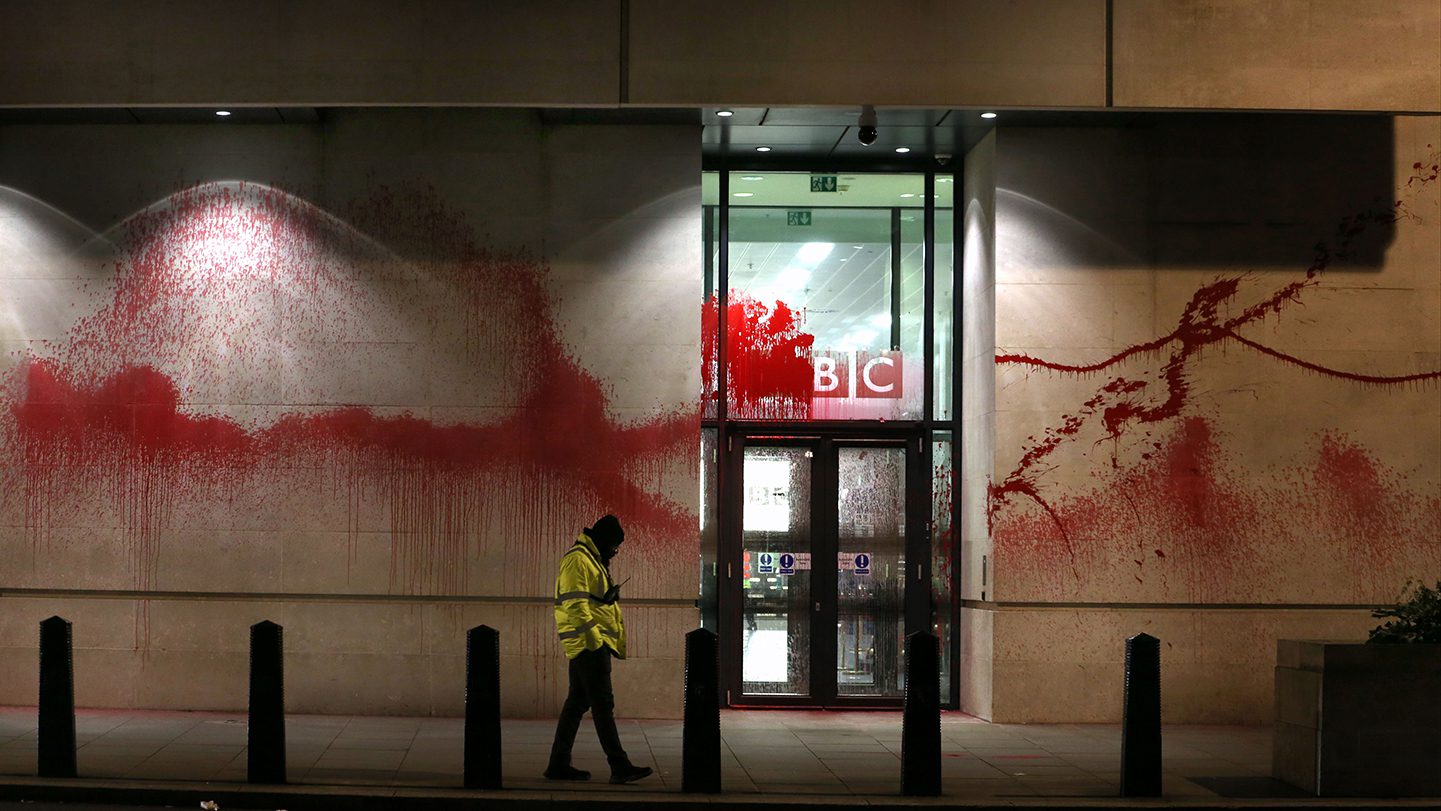 Palestine demonstrators cover BBC London offices in red paint in protest against complicity in genocide