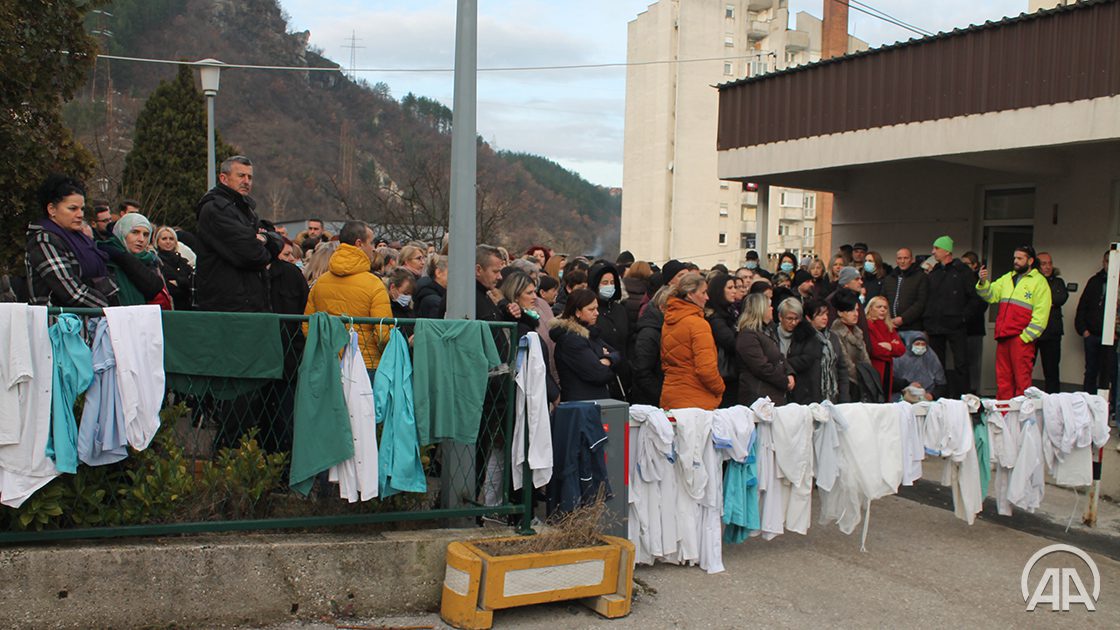 Health workers hang up their lab coats in protest
