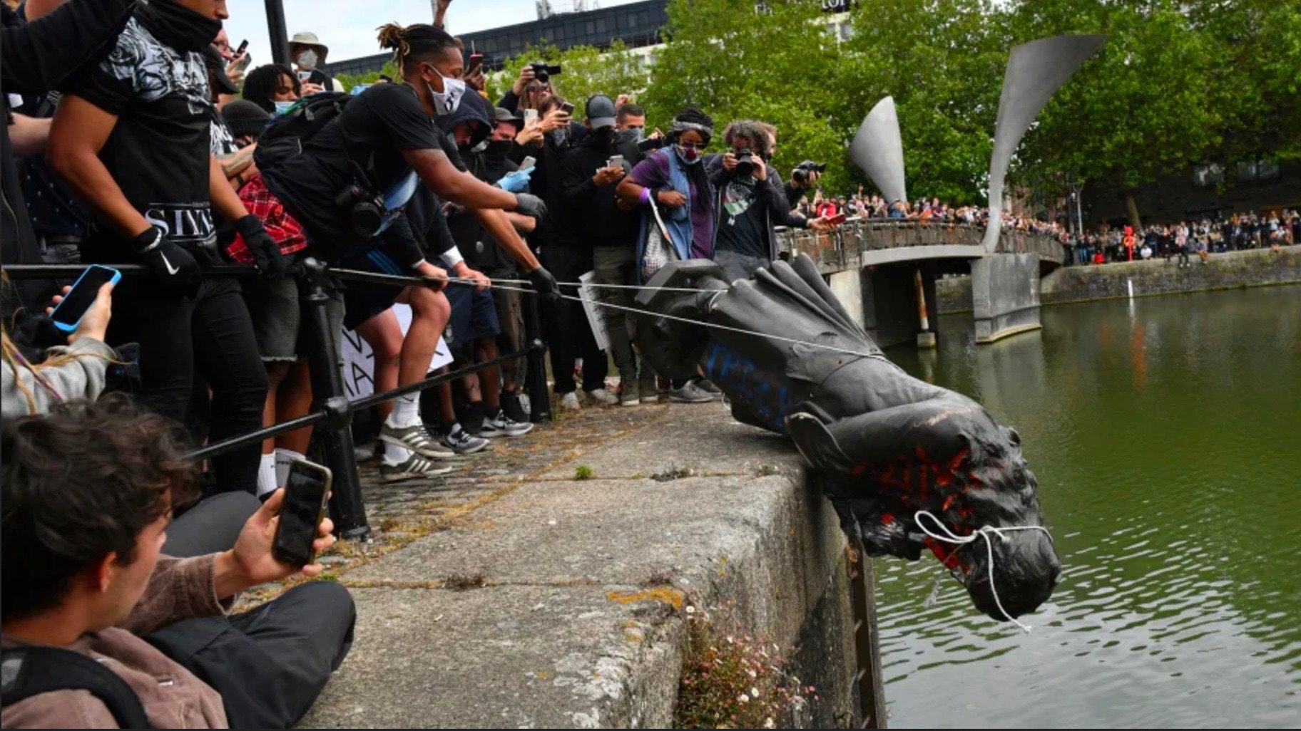 Tear down the racist statues, end racist debt and pay for equalizing reparations