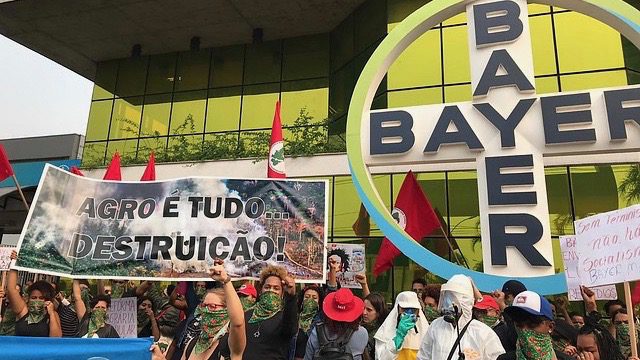 “Bayer Monsanto means death”: MST women protest outside company HQ in São Paulo