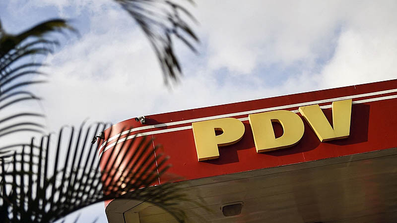 What is known about the corruption investigation in Venezuela’s state-owned oil company
