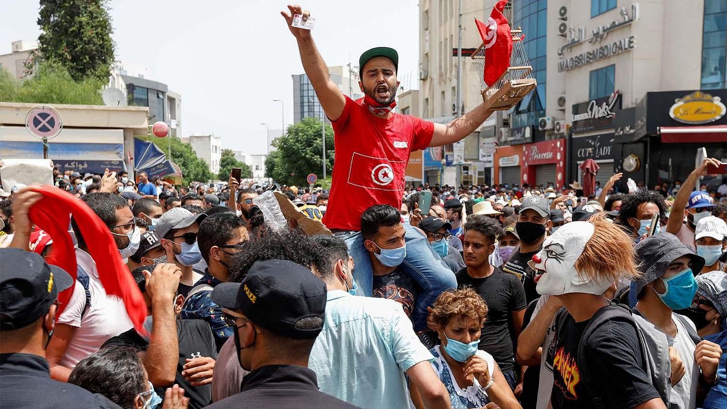 Tunisian president sacks prime minister, suspends parliament