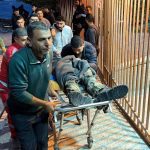 Palestinians in Gaza carry martyrs of the latest Israeli airstrike on the strip