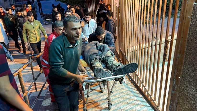 Palestinians in Gaza carry martyrs of the latest Israeli airstrike on the strip
