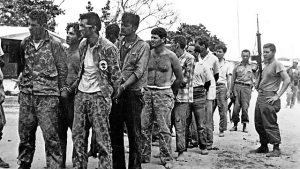 US forces handcuffed and in a line in Cuba