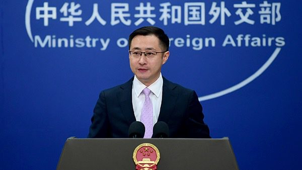 Foreign Ministry Spokesperson Lin Jian at podium in front of blue background