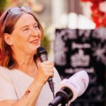 Elke Kahr from the KPO in Graz, Austria speaks into microphone after election victory