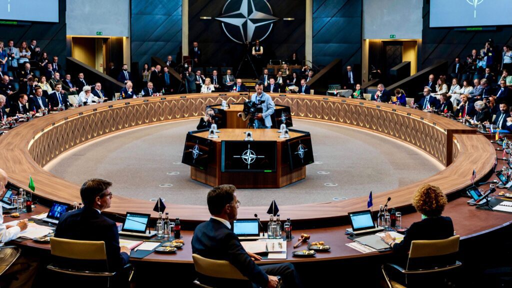 NATO defense ministers meeting 1 - BT News NATO defense ministers sit around a table