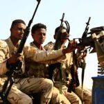 Rapid Support Forces unit patrol during a rally for Gen. Mohammed Hamdan Dagalo, in Garawee town, north of Sudan, on June 15, 2019.