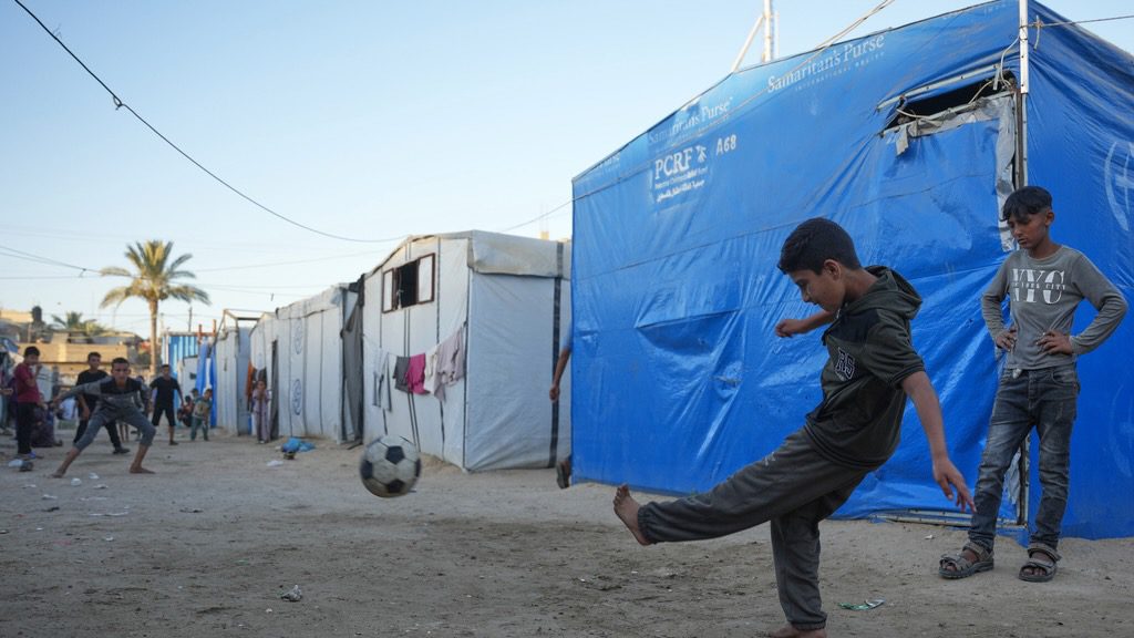 Youth play soccer in Gaza