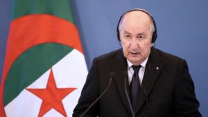 Algeria's President Abdelmadjid Tebboune speaking at a podium