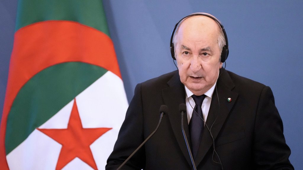 Algeria's President Abdelmadjid Tebboune speaking at a podium