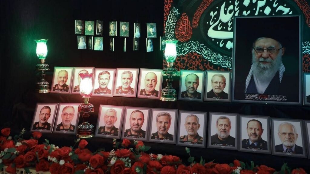 Vigil with images of recent Iranian victims of US bombings