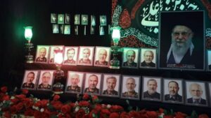 30 Iranians killed by US 1 - BT News Vigil with images of recent Iranian victims of US bombings