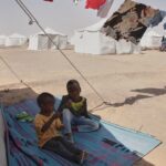 Displaced Sudanese children displaced at the El-Afadh camp in Al Dabbah, in Sudan's Northern State, in November, 2025.