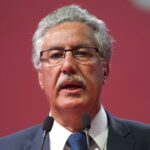 Hamma Hammami speaks at podium
