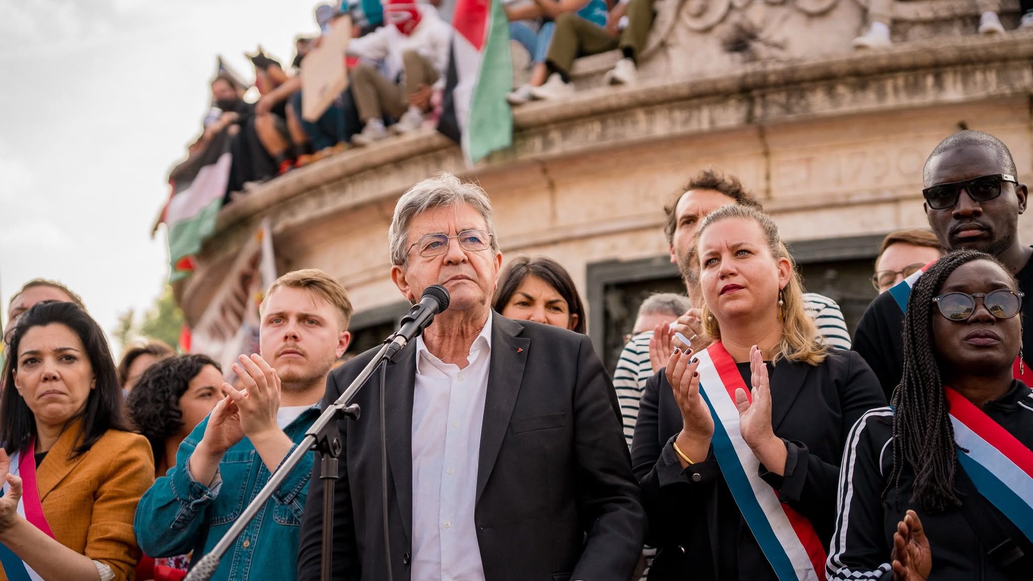 La France Insoumises Jean-Luc Mélenchon speaks in front of a crowd