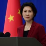 Mao Ning at podium at regular MFA press conference