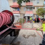 Man pulls hose out of water tank in San Juan, PR