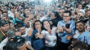 Keiko Fujimori surrounded by supporters