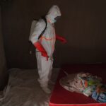 a health worker on the prevention and control team seen at work