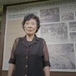 Chun Mi-Kyung, president of the Daejeon Massacre Bereaved Families Association, stands in front of memorial of the Daejeon Massacre