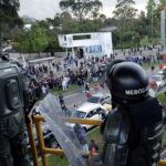 Riot police outside the National University in Colombia